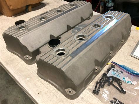 Machined with the correct wrench flats to assist in assembly to the body. . Mopar performance 426 hemi valve covers
